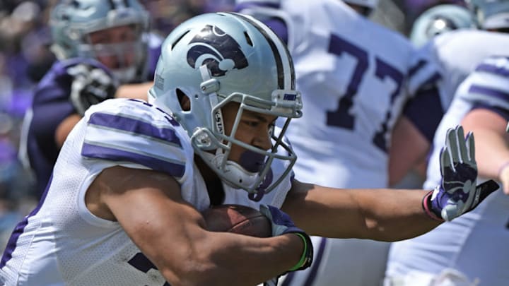 MANHATTAN, KS - April 22: Running back Justin Silmon No. 33 of the Kansas State Wildcats rushes up field during the Purple and White Spring Game on April 22, 2017 at Bill Snyder Family Stadium in Manhattan, Kansas. (Photo by Peter G. Aiken/Getty Images)