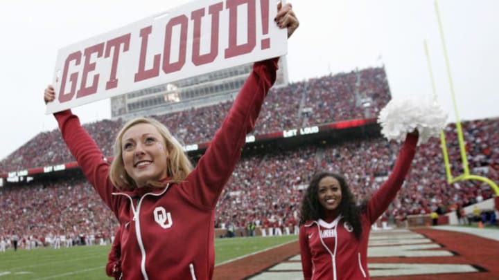 NORMAN, OK - DECEMBER 6: Oklahoma Sooners cheerleaders perform during the game against the Oklahoma State Cowboys December 6, 2014 at Gaylord Family-Oklahoma Memorial Stadium in Norman, Oklahoma. The Cowboys defeated the Sooners 38-35 in overtime. (Photo by Brett Deering/Getty Images)