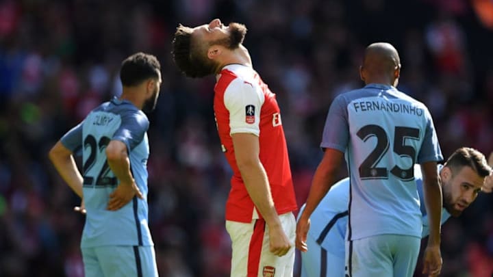 LONDON, ENGLAND - APRIL 23: Olivier Giroud of Arsenal reacts during the Emirates FA Cup Semi-Final match between Arsenal and Manchester City at Wembley Stadium on April 23, 2017 in London, England. (Photo by Shaun Botterill/Getty Images,)