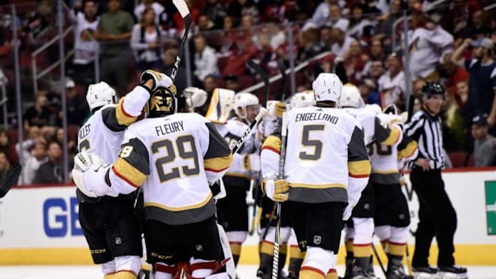 GLENDALE, AZ - OCTOBER 07: The Vegas Golden Knights celebrate after the team defeated the Arizona Coyotes 2-1 in overtime at Gila River Arena on October 7, 2017 in Glendale, Arizona. (Photo by David Becker/NHLI via Getty Images)