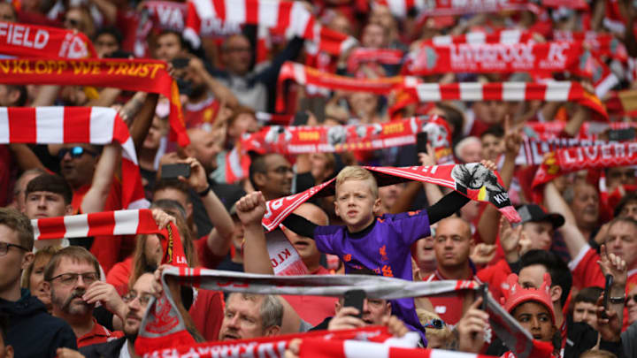 LIVERPOOL, ENGLAND - AUGUST 12: Fans look on, showing support during the Premier League match between Liverpool FC and West Ham United at Anfield on August 12, 2018 in Liverpool, United Kingdom. (Photo by Laurence Griffiths/Getty Images)