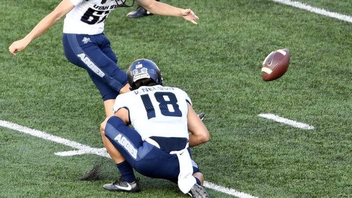 WINSTON SALEM, NC – SEPTEMBER 16: Place kicker Dominik Eberle #62 of the Utah State Aggies kicks a field goal against the Wake Forest Demon Deacons during the football game at BB&T Field on September 16, 2017 in Winston Salem, North Carolina. (Photo by Mike Comer/Getty Images)