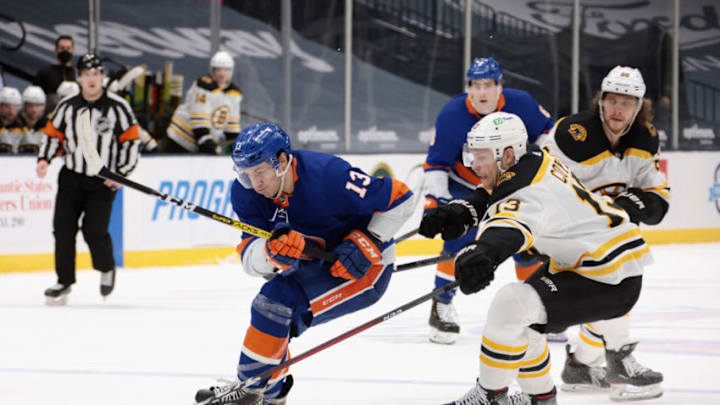 UNIONDALE, NEW YORK - MARCH 09: Mathew Barzal #13 of the New York Islanders skates against the Boston Bruins at the Nassau Coliseum on March 09, 2021 in Uniondale, New York. (Photo by Bruce Bennett/Getty Images)