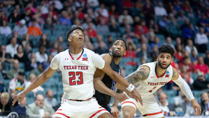TULSA, OK - MARCH 24: Texas Tech Red Raiders guard Jarrett Culver (23) boxes out Buffalo Bulls guard CJ Massinburg (5) during the second round NCAA Tournament game on March 24, 2019 at BOK Center in Tulsa, Oklahoma. (Photo by William Purnell/Icon Sportswire via Getty Images)