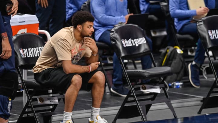 Jamal Murray, Denver Nuggets watches the action from the bench area in Game 3 of the Western Conference second-round playoff series. (Photo by Dustin Bradford/Getty Images)