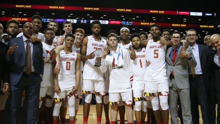 Nov 26, 2016; Brooklyn, NY, USA; The Maryland Terrapins pose with the tournament trophy after the championship game against the Kansas State Wildcats in the Barclays Center Classic at Barclays Center. Maryland won 69-68. Mandatory Credit: Vincent Carchietta-USA TODAY Sports