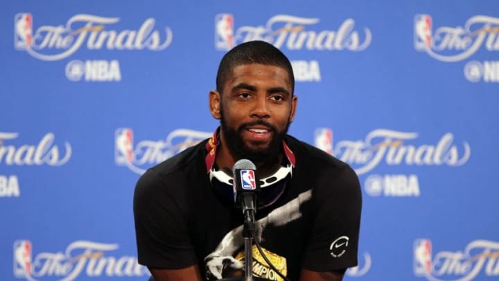 June 19, 2016; Oakland, CA, USA; Cleveland Cavaliers guard Kyrie Irving (2) speaks to media following the 93-89 victory against the Golden State Warriors in game seven of the NBA Finals at Oracle Arena. Mandatory Credit: Kelley L Cox-USA TODAY Sports