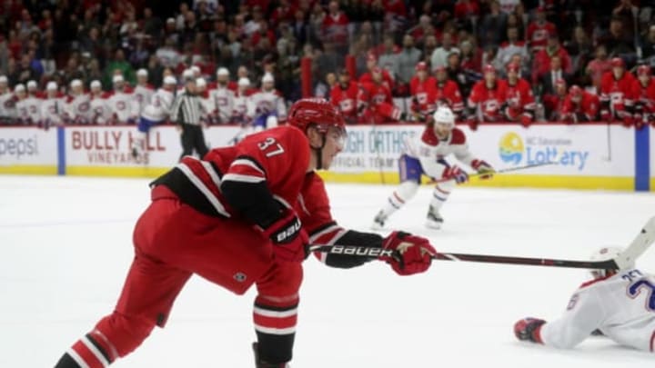 RALEIGH, NC – MARCH 24: Andrei Svechnikov #37 of the Carolina Hurricanes shoots the puck and scores the game winner in overtime to defeat the Montreal Canadiens during an NHL game on March 24, 2019 at PNC Arena in Raleigh, North Carolina. (Photo by Gregg Forwerck/NHLI via Getty Images)