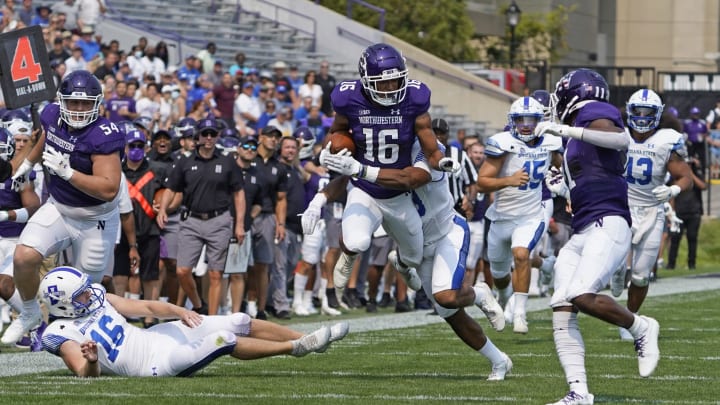 Sep 11, 2021; Evanston, Illinois, USA; Northwestern Wildcats safety Brandon Joseph (16) runs back a punt against the Indiana State Sycamores during the second half at Ryan Field. Mandatory Credit: David Banks-USA TODAY Sports