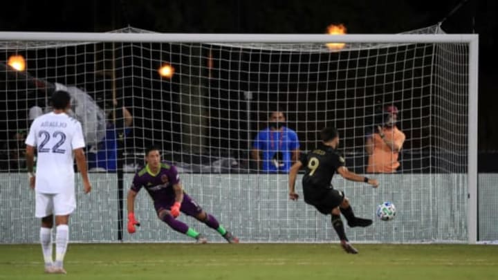 REUNION, FLORIDA – JULY 18: Diego Rossi #9 of Los Angeles FC scores a goal on a penalty kick in the first half against the Los Angeles Galaxy during the MLS Is Back Tournament at ESPN Wide World of Sports Complex on July 18, 2020 in Reunion, Florida. (Photo by Mike Ehrmann/Getty Images)
