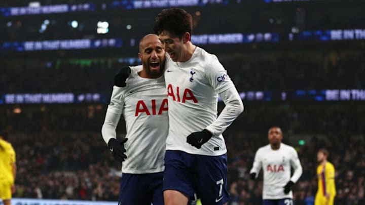 Tottenham Hotspur's South Korean striker Son Heung-Min (centre right) celebrates with Tottenham Hotspur's Brazilian midfielder Lucas Moura (L) after scoring their third goal during the English Premier League football match between Tottenham Hotspur and Crystal Palace at Tottenham Hotspur Stadium in London, on December 26, 2021. - - RESTRICTED TO EDITORIAL USE. No use with unauthorized audio, video, data, fixture lists, club/league logos or 'live' services. Online in-match use limited to 120 images. An additional 40 images may be used in extra time. No video emulation. Social media in-match use limited to 120 images. An additional 40 images may be used in extra time. No use in betting publications, games or single club/league/player publications. (Photo by Adrian DENNIS / AFP) / RESTRICTED TO EDITORIAL USE. No use with unauthorized audio, video, data, fixture lists, club/league logos or 'live' services. Online in-match use limited to 120 images. An additional 40 images may be used in extra time. No video emulation. Social media in-match use limited to 120 images. An additional 40 images may be used in extra time. No use in betting publications, games or single club/league/player publications. / RESTRICTED TO EDITORIAL USE. No use with unauthorized audio, video, data, fixture lists, club/league logos or 'live' services. Online in-match use limited to 120 images. An additional 40 images may be used in extra time. No video emulation. Social media in-match use limited to 120 images. An additional 40 images may be used in extra time. No use in betting publications, games or single club/league/player publications. (Photo by ADRIAN DENNIS/AFP via Getty Images)