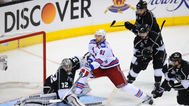 07 June 2014: New York Rangers Right Wing Rick Nash (61) [2288] attempts a shot on goal against Los Angeles Kings Defenseman Drew Doughty (8) [6495] and Los Angeles Kings Goalie Jonathan Quick (32) [5348] during the first overtime period of game 2 of the Stanley Cup Final between the New York Rangers and the Los Angeles Kings at Staples Center in Los Angeles, CA. (Photo by Chris Williams/Icon Sportswire via Getty Images)
