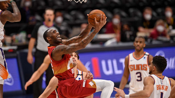 Will Barton, Denver Nuggets goes for a reverse layup in the second round series against the Phoenix Suns. (Photo by Dustin Bradford/Getty Images)