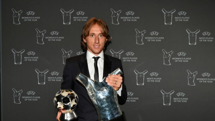 MONACO, MONACO - AUGUST 30: Luka Modric of Real Madrid with his UEFA Player of the Year Award and UEFA Champions League Midfielder of the Season Award following the Champions League Group Stage draw part of the UEFA ECF Season Kick Off 2018/19 on August 30, 2018 in Monaco, Monaco. (Photo by Harold Cunningham - UEFA/UEFA via Getty Images)