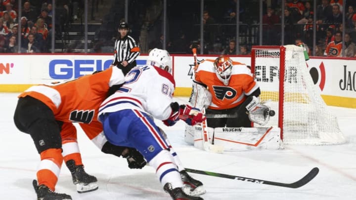 PHILADELPHIA, PA - JANUARY 16: Alex Lyon #34 of the Philadelphia Flyers makes a save against Artturi Lehkonen #62 of the Montreal Canadiens in the second period at the Wells Fargo Center on January 16, 2020 in Philadelphia, Pennsylvania. (Photo by Mitchell Leff/Getty Images)