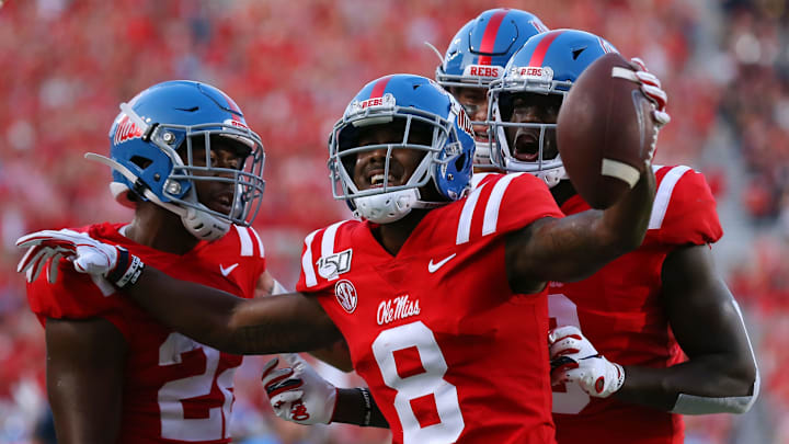 OXFORD, MISSISSIPPI – SEPTEMBER 07: Elijah Moore #8 of the Mississippi Rebels celebrates a touchdown during the first half against the Arkansas Razorbacks of a game at Vaught-Hemingway Stadium on September 07, 2019 in Oxford, Mississippi. (Photo by Jonathan Bachman/Getty Images)