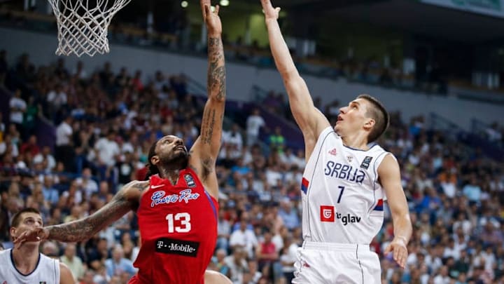 BELGRADE, SERBIA - JULY 04: Bogdan Bogdanovic (R) of Serbia in action against Renaldo Balkman (L) of Puerto Rico during the 2016 FIBA World Olympic Qualifying basketball Group A match between Serbia and Puerto Rico at Kombank Arena on July 04, 2016 in Belgrade, Serbia. (Photo by Srdjan Stevanovic/Getty Images)