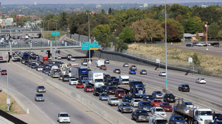 DENVER, CO - OCTOBER 02: Traffic drives on the segement of Interstate 25 near the venue for the first presidential debate on October 2, 2012 in Denver, Colorado. The Interstate will be closed from 5 PM until 10 PM when Republican presidential candidate Mitt Romney will square off against U.S. President Barack Obama in the first of three debates on October 3. (Photo by Doug Pensinger/Getty Images)
