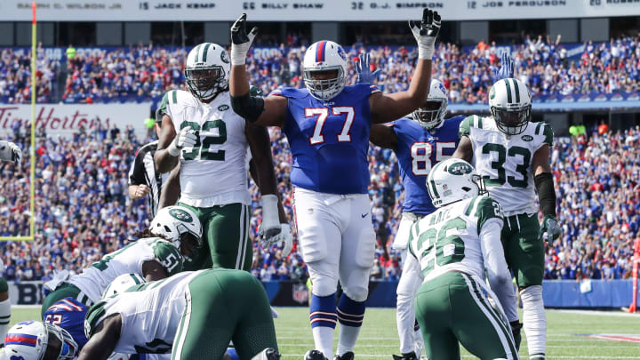 ORCHARD PARK, NY – SEPTEMBER 10: Cordy Glenn #77 of the Buffalo Bills signals touchdown during the second half against the New York Jets on September 10, 2017 at New Era Field in Orchard Park, New York. (Photo by Tom Szczerbowski/Getty Images)