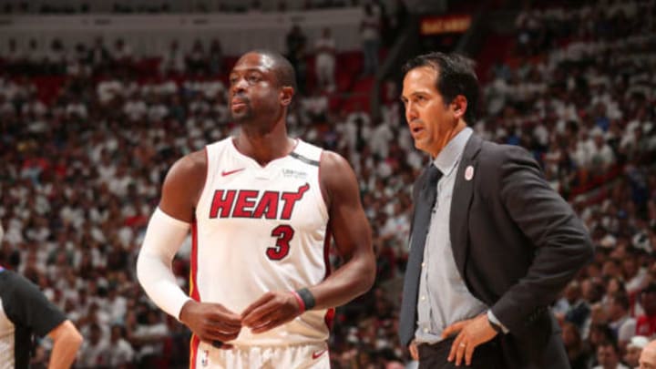 MIAMI, FL – APRIL 21: Dwyane Wade #3 and Head Coach Erik Spoelstra of the Miami Heat look on in Game Four of the Eastern Conference Quarterfinals against the Philadelphia 76ers during the 2018 NBA Playoffs on April 21, 2018 at American Airlines Arena in Miami, Florida. NOTE TO USER: User expressly acknowledges and agrees that, by downloading and/or using this photograph, user is consenting to the terms and conditions of the Getty Images License Agreement. Mandatory Copyright Notice: Copyright 2018 NBAE (Photo by Issac Baldizon/NBAE via Getty Images)