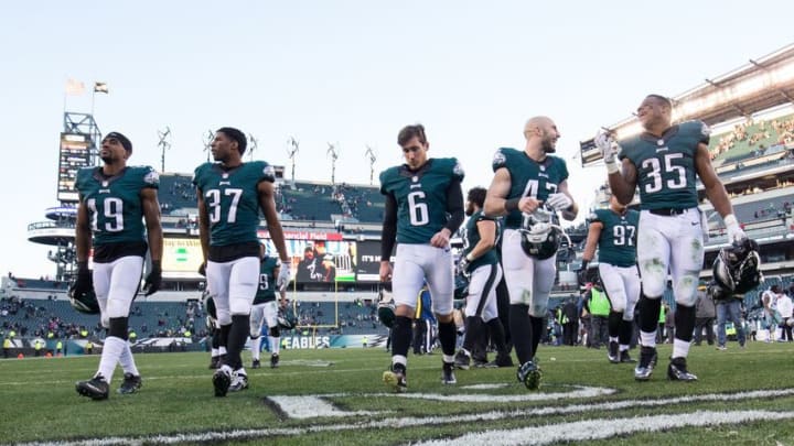 Jan 1, 2017; Philadelphia, PA, USA; Philadelphia Eagles wide receiver Paul Turner (19) and cornerback C.J. Smith (37) and kicker Caleb Sturgis (6) and free safety Chris Maragos (42) and running back Terrell Watson (35) walk off the field after a victory against the Dallas Cowboys at Lincoln Financial Field. The Philadelphia Eagles won 27-13. Mandatory Credit: Bill Streicher-USA TODAY Sports