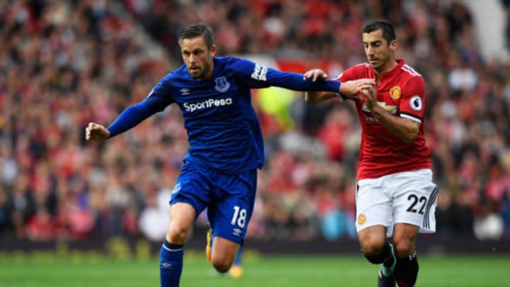 Gylfi Sigurdsson of Everton and Henrikh Mkhitaryan of Manchester United battle for possession during the Premier League match between Manchester United and Everton at Old Trafford on September 17, 2017 in Manchester, England. (Photo by Stu Forster/Getty Images)