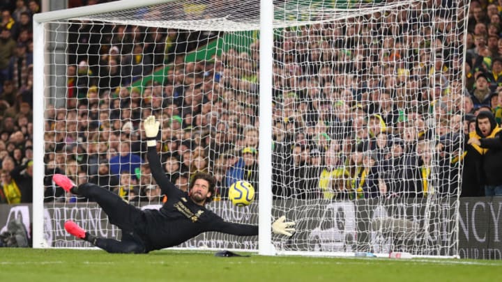 NORWICH, ENGLAND - FEBRUARY 15: Alisson Becker of Liverpool looks to save a shot during the Premier League match between Norwich City and Liverpool FC at Carrow Road on February 15, 2020 in Norwich, United Kingdom. (Photo by Catherine Ivill/Getty Images)