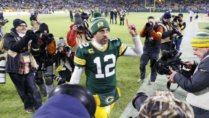 Jan 1, 2023; Green Bay, Wisconsin, USA; Green Bay Packers quarterback Aaron Rodgers (12) walks off the field following the game against the Minnesota Vikings at Lambeau Field. Mandatory Credit: Jeff Hanisch-USA TODAY Sports