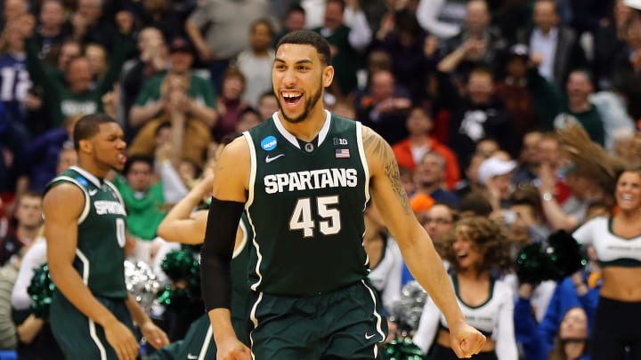 SYRACUSE, NY – MARCH 27: Denzel Valentine #45 of the Michigan State Spartans celebrates after defeating the Oklahoma Sooners 62 to 58 during the East Regional Semifinal of the 2015 NCAA Men’s Basketball Tournament at the Carrier Dome on March 27, 2015 in Syracuse, New York. (Photo by Elsa/Getty Images)