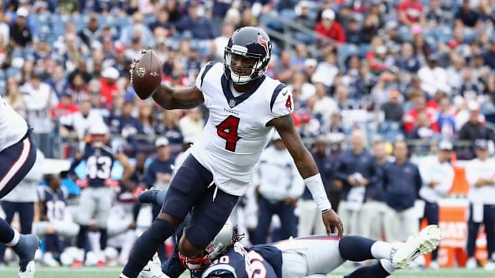 FOXBOROUGH, MA - SEPTEMBER 09: Deshaun Watson #4 of the Houston Texans runs with the ball as Malcom Brown #90 of the New England Patriots attempts to tackle him during the second half at Gillette Stadium on September 9, 2018 in Foxborough, Massachusetts. (Photo by Maddie Meyer/Getty Images)