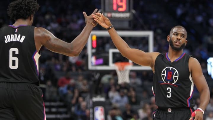 Oct 18, 2016; Sacramento, CA, USA; Los Angeles Clippers guard Chris Paul (3) and center DeAndre Jordan (6) celebrate during the second quarter against the Sacramento Kings at Golden 1 Center. Mandatory Credit: Sergio Estrada-USA TODAY Sports