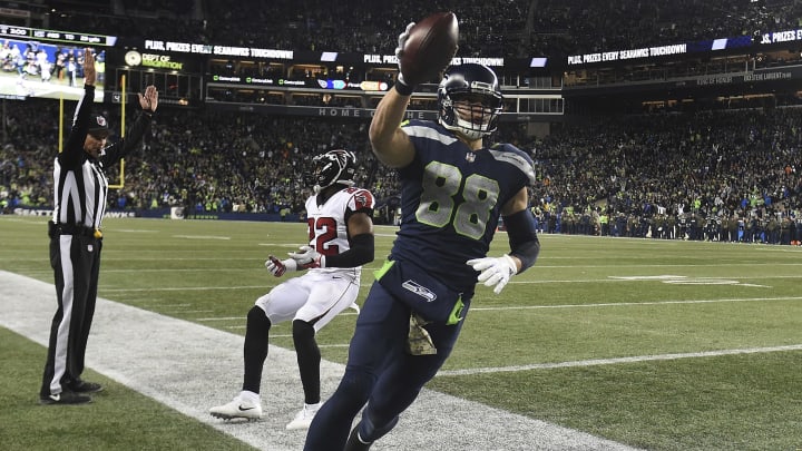 SEATTLE, WA – NOVEMBER 20: Tight end Jimmy Graham of the Seattle Seahawks scores a two-point conversion in front of strong safety Keanu Neal #22 of the Atlanta Falcons during the fourth quarter of the game at CenturyLink Field on November 20, 2017 in Seattle, Washington. The Falcons won the game 34-31. (Photo by Steve Dykes/Getty Images)