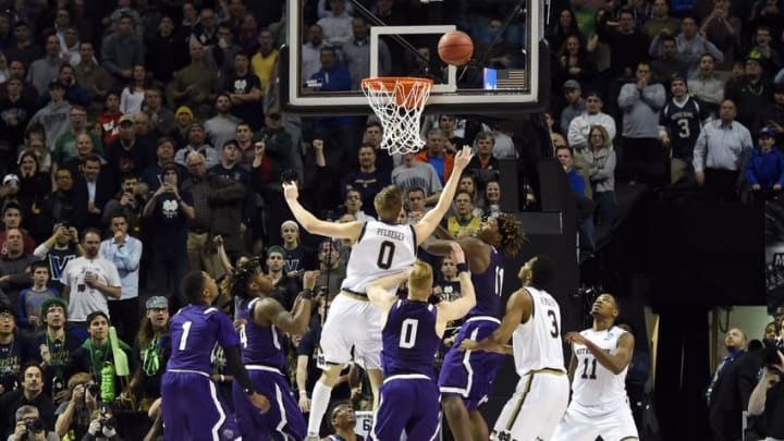 Mar 20, 2016; Brooklyn, NY, USA; Notre Dame Fighting Irish guard Rex Pflueger (0) tips in the winning basket against the Stephen F. Austin Lumberjacks during the second half in the second round of the 2016 NCAA Tournament at Barclays Center. Mandatory Credit: Robert Deutsch-USA TODAY Sports