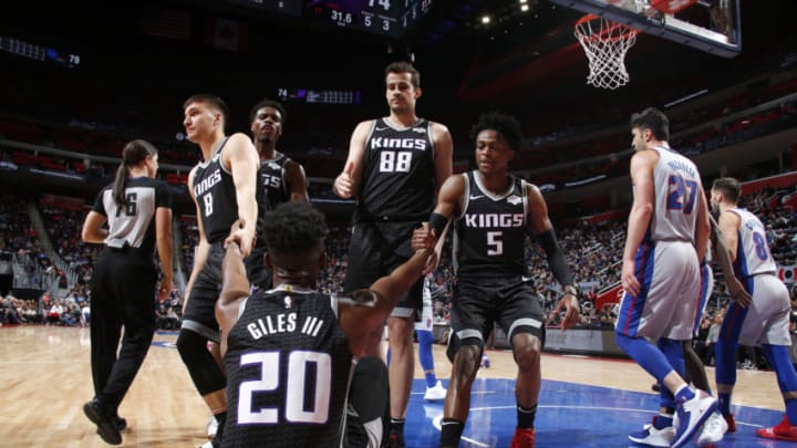 DETROIT, MI - JANUARY 19: Harry Giles #20 of the Sacramento Kings helped to feet by teammates against the Detroit Pistons on January 19, 2019 at Little Caesars Arena in Detroit, Michigan. NOTE TO USER: User expressly acknowledges and agrees that, by downloading and/or using this photograph, User is consenting to the terms and conditions of the Getty Images License Agreement. Mandatory Copyright Notice: Copyright 2019 NBAE (Photo by Brian Sevald/NBAE via Getty Images)