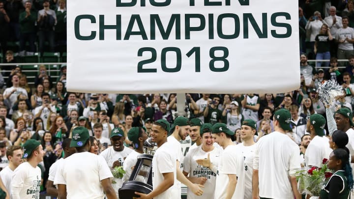 EAST LANSING, MI – FEBRUARY 20: Miles Bridges #22 of the Michigan State Spartans holds the Big Ten trophy after the Spartan defeated the Illinois Fighting Illini at Breslin Center on February 20, 2018 in East Lansing, Michigan. (Photo by Rey Del Rio/Getty Images)