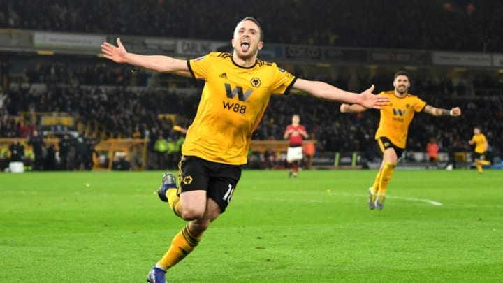 WOLVERHAMPTON, ENGLAND - MARCH 16: Diogo Jota of Wolverhampton Wanderers (R) celebrates after scoring his team's second goal during the FA Cup Quarter Final match between Wolverhampton Wanderers and Manchester United at Molineux on March 16, 2019 in Wolverhampton, England. (Photo by Michael Regan/Getty Images)
