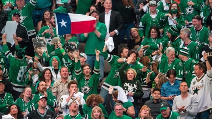Apr 22, 2016; Dallas, TX, USA; The Dallas Stars fans celebrate a goal against the Minnesota Wild in game five of the first round of the 2016 Stanley Cup Playoffs at the American Airlines Center. The Wild defeat the Stars 5-4. Mandatory Credit: Jerome Miron-USA TODAY Sports