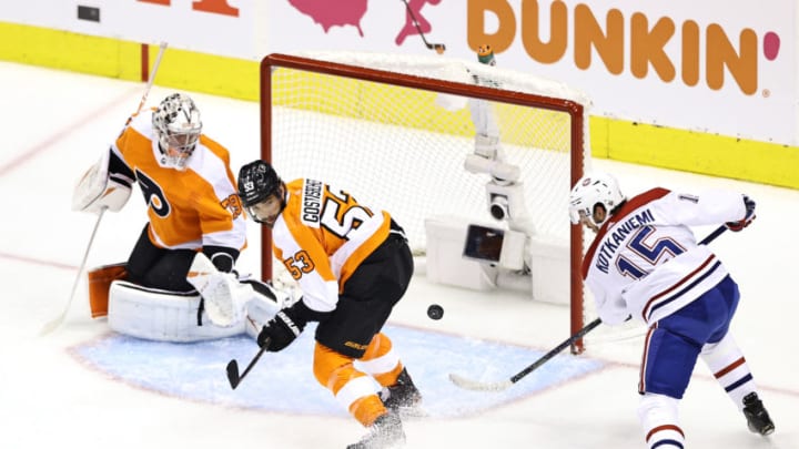 TORONTO, ONTARIO - AUGUST 14: Jesperi Kotkaniemi #15 of the Montreal Canadiens takes a shot on Carter Hart #79 of the Philadelphia Flyers during the first period in Game Two of the Eastern Conference First Round during the 2020 NHL Stanley Cup Playoffs at Scotiabank Arena on August 14, 2020 in Toronto, Ontario, Canada. (Photo by Elsa/Getty Images)