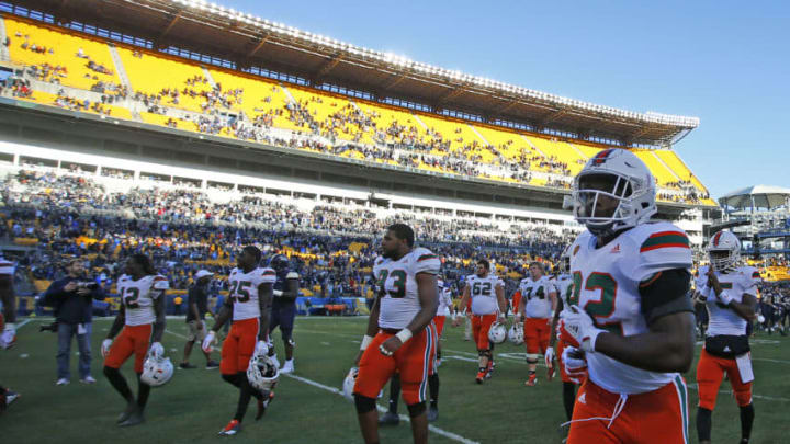 PITTSBURGH, PA - NOVEMBER 24: The Miami Hurricanes walk off the field after being upset 24-14 against the Pittsburgh Panthers on November 24, 2017 at Heinz Field in Pittsburgh, Pennsylvania. (Photo by Justin K. Aller/Getty Images)