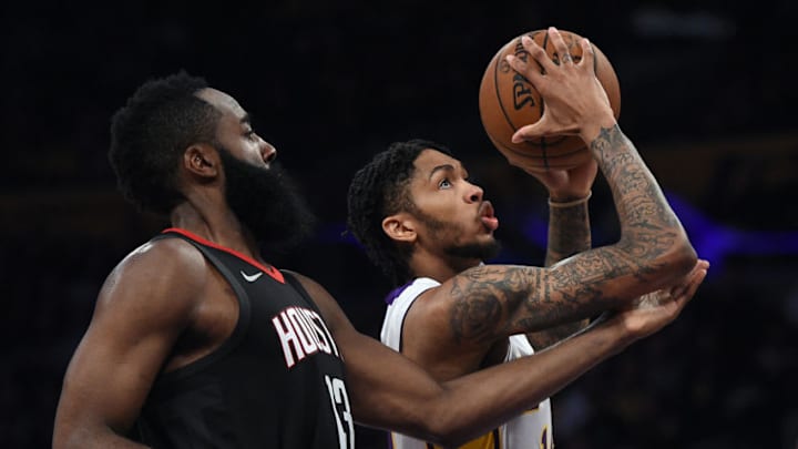 LOS ANGELES, CA - DECEMBER 3: Brandon Ingram #14 of the Los Angeles Lakers drives to the basket defense by James Harden #13 of the Houston Rockets during the second half of the basketball game at Staples Center December 5, 2017, in Los Angeles, California. NOTE TO USER: User expressly acknowledges and agrees that, by downloading and or using this photograph, User is consenting to the terms and conditions of the Getty Images License Agreement. (Photo by Kevork Djansezian/Getty Images) LOS ANGELES, CA - DECEMBER 3: Brandon Ingram #14 of the Los Angeles Lakers drives to the basket defense by James Harden #13 of the Houston Rockets during the second half of the basketball game at Staples Center December 5, 2017, in Los Angeles, California. NOTE TO USER: User expressly acknowledges and agrees that, by downloading and or using this photograph, User is consenting to the terms and conditions of the Getty Images License Agreement. (Photo by Kevork Djansezian/Getty Images)