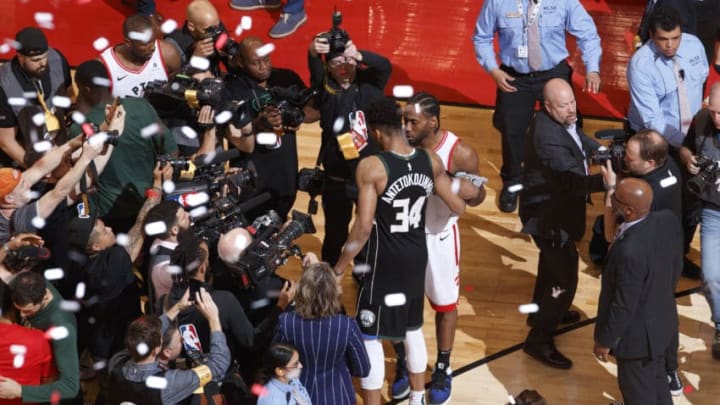 TORONTO, CANADA - MAY 25: Giannis Antetokounmpo #34 of the Milwaukee Bucks and Kawhi Leonard #2 of the Toronto Raptors talk after Game Six of the Eastern Conference Finals on May 25, 2019 at Scotiabank Arena in Toronto, Ontario, Canada. NOTE TO USER: User expressly acknowledges and agrees that, by downloading and/or using this photograph, user is consenting to the terms and conditions of the Getty Images License Agreement. Mandatory Copyright Notice: Copyright 2019 NBAE (Photo by Mark Blinch/NBAE via Getty Images)