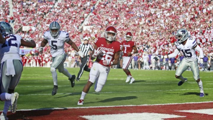 NORMAN, OK - OCTOBER 27: Running back Kennedy Brooks #26 of the Oklahoma Sooners scores against the Kansas State Wildcats at Gaylord Family Oklahoma Memorial Stadium on October 27, 2018 in Norman, Oklahoma. (Photo by Brett Deering/Getty Images)