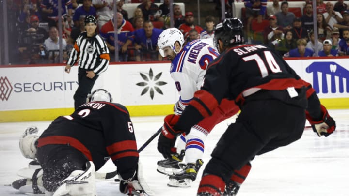 RALEIGH, NORTH CAROLINA - MAY 30: Chris Kreider #20 of the New York Rangers scores a third period goal against Pyotr Kochetkov #52 of the Carolina Hurricanes in Game Seven of the Second Round of the 2022 Stanley Cup Playoffs at PNC Arena on May 30, 2022 in Raleigh, North Carolina. (Photo by Jared C. Tilton/Getty Images)