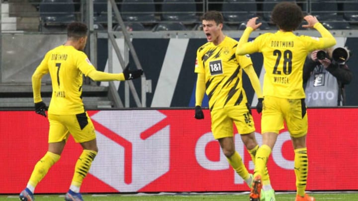 Gio Reyna celebrates after scoring against Eintracht Frankfurt (Photo by DANIEL ROLAND/POOL/AFP via Getty Images)