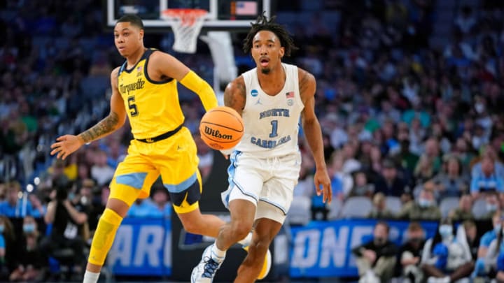Mar 17, 2022; Fort Worth, TX, USA; North Carolina Tar Heels guard Leaky Black (1) dribbles the ball against Marquette Golden Eagles guard Greg Elliott (5) during the first half during the first round of the 2022 NCAA Tournament at Dickies Arena. Mandatory Credit: Chris Jones-USA TODAY Sports