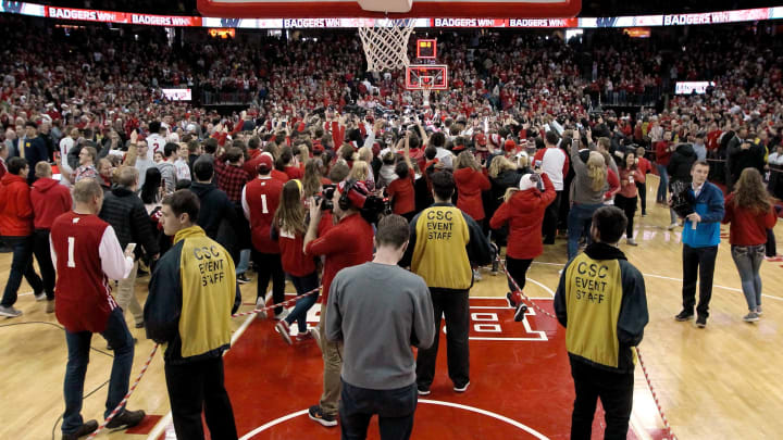 MADISON, WISCONSIN – JANUARY 19: Fans rush the court after the Wisconsin Badgers beat the Michigan Wolverines 64-54 at the Kohl Center on January 19, 2019 in Madison, Wisconsin. (Photo by Dylan Buell/Getty Images)
