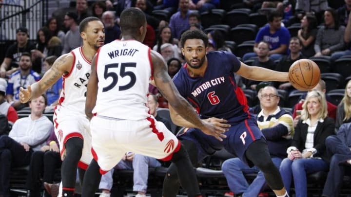 Feb 28, 2016; Auburn Hills, MI, USA; Detroit Pistons forward Darrun Hilliard (6) gets defended by Toronto Raptors guard Norman Powell (24) and guard Delon Wright (55) during the fourth quarter at The Palace of Auburn Hills. Pistons win 114-101. Mandatory Credit: Raj Mehta-USA TODAY Sports