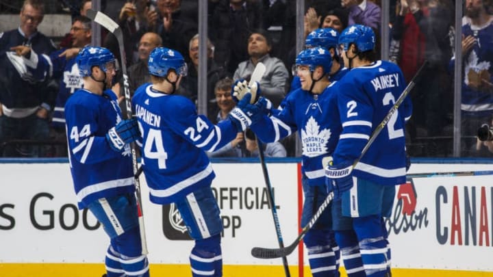 TORONTO, ON - FEBRUARY 27: Andreas Johnsson #18 of the Toronto Maple Leafs celebrates his goal with Ron Hainsey #2, Kasperi Kapanen #24, and Morgan Rielly #44 against the Edmonton Oilers during the second period at the Scotiabank Arena on February 27, 2019 in Toronto, Ontario, Canada. (Photo by Mark Blinch/NHLI via Getty Images)