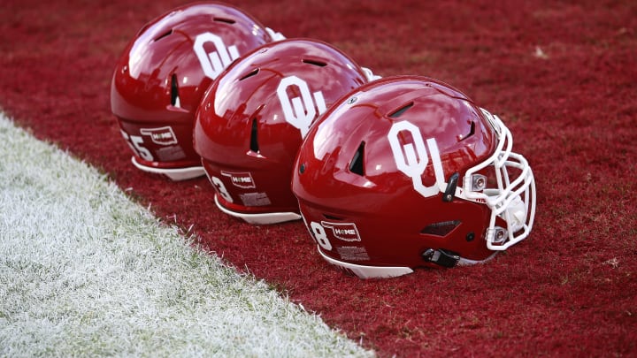 NORMAN, OK – OCTOBER 29: Oklahoma Sooners helmets on the field before the game against the Kansas Jayhawks October 29, 2016 at Gaylord Family-Oklahoma Memorial Stadium in Norman, Oklahoma. The Sooners defeated the Jayhawks 56-3. (Photo by Brett Deering/Getty Images)