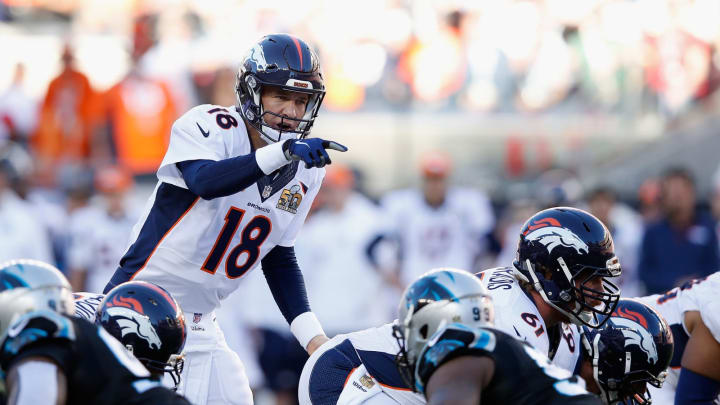 SANTA CLARA, CA – FEBRUARY 07: Quarterback Peyton Manning #18 of the Denver Broncos communicates with teammates while playing against the Carolina Panthers during Super Bowl 50 at Levi’s Stadium on February 7, 2016 in Santa Clara, California. (Photo by Ezra Shaw/Getty Images)